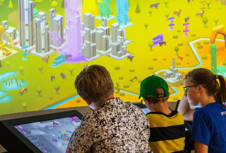 Children play the Utah Climate Challenge at NHMU